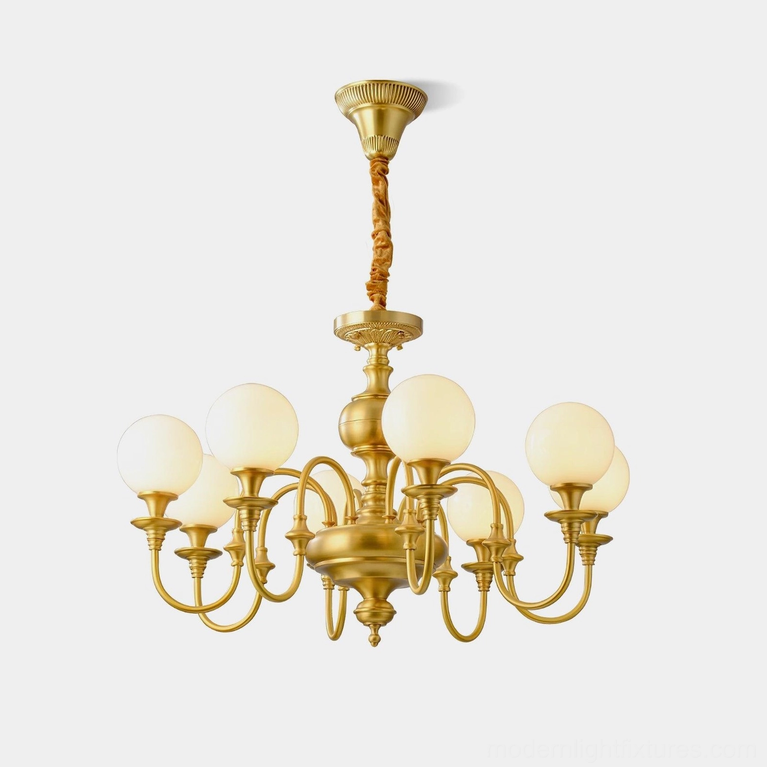 Beatty brass multi-head chandelier with frosted white glass shades, front low-angle view showcasing gold brass frame and spherical globe design
