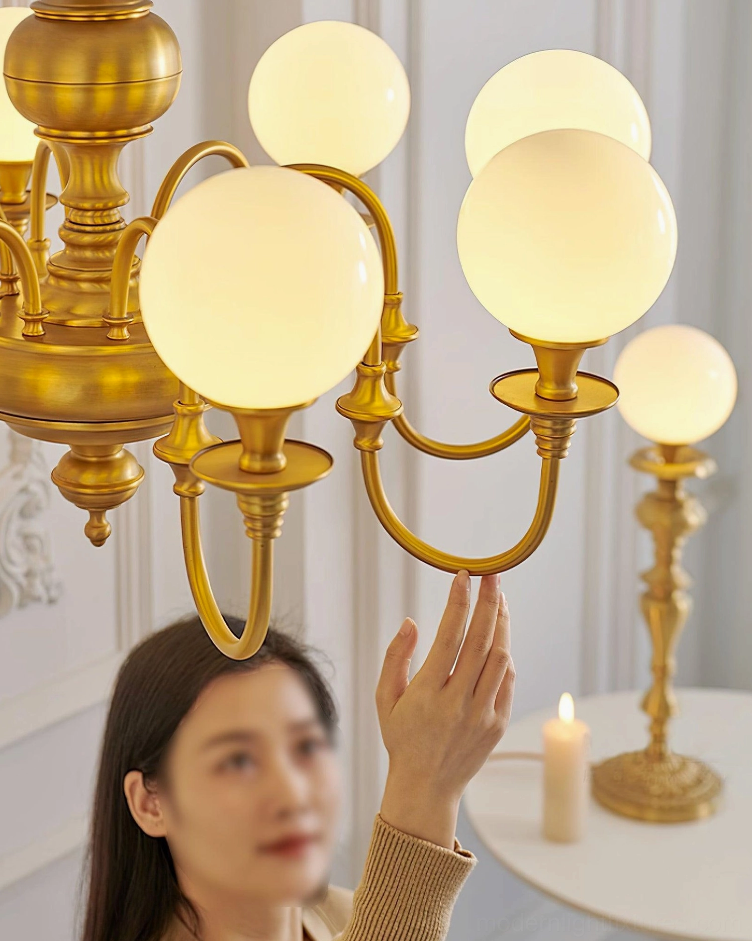 Beatty brass chandelier overhead view showing proportional arm spacing and frosted globe light distribution pattern