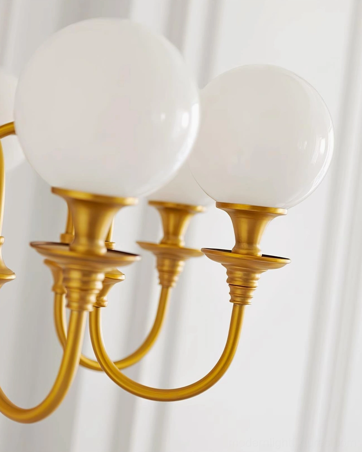 Beatty brass chandelier vintage-inspired design aesthetic with golden brass finish and classic globe proportions