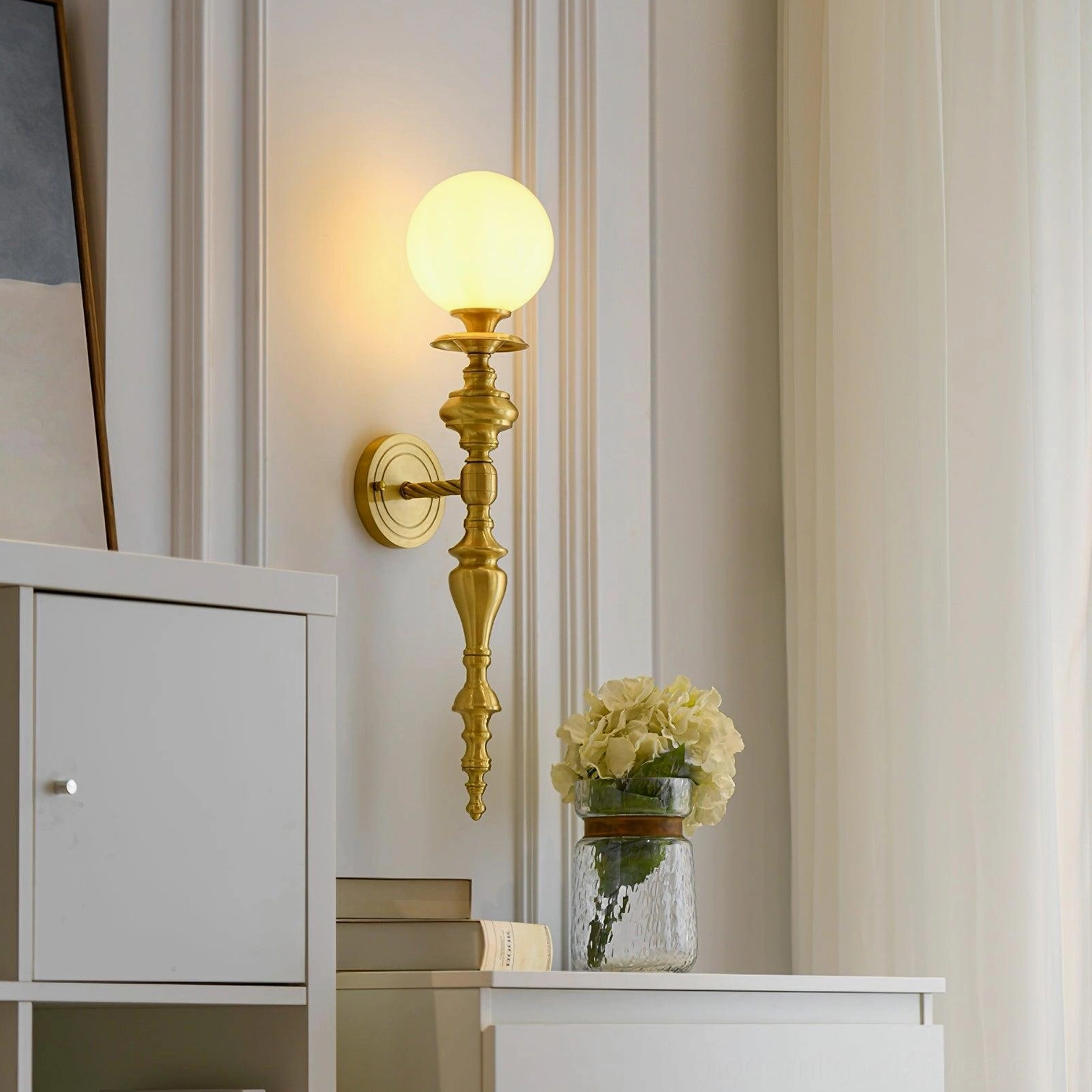 Beatty brass wall sconce architectural detail showing mounting and decorative hardware finish