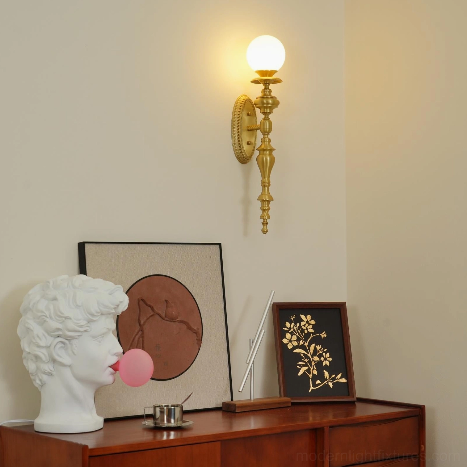 Brass wall sconce transitional luxury design element in contemporary bedroom space lighting