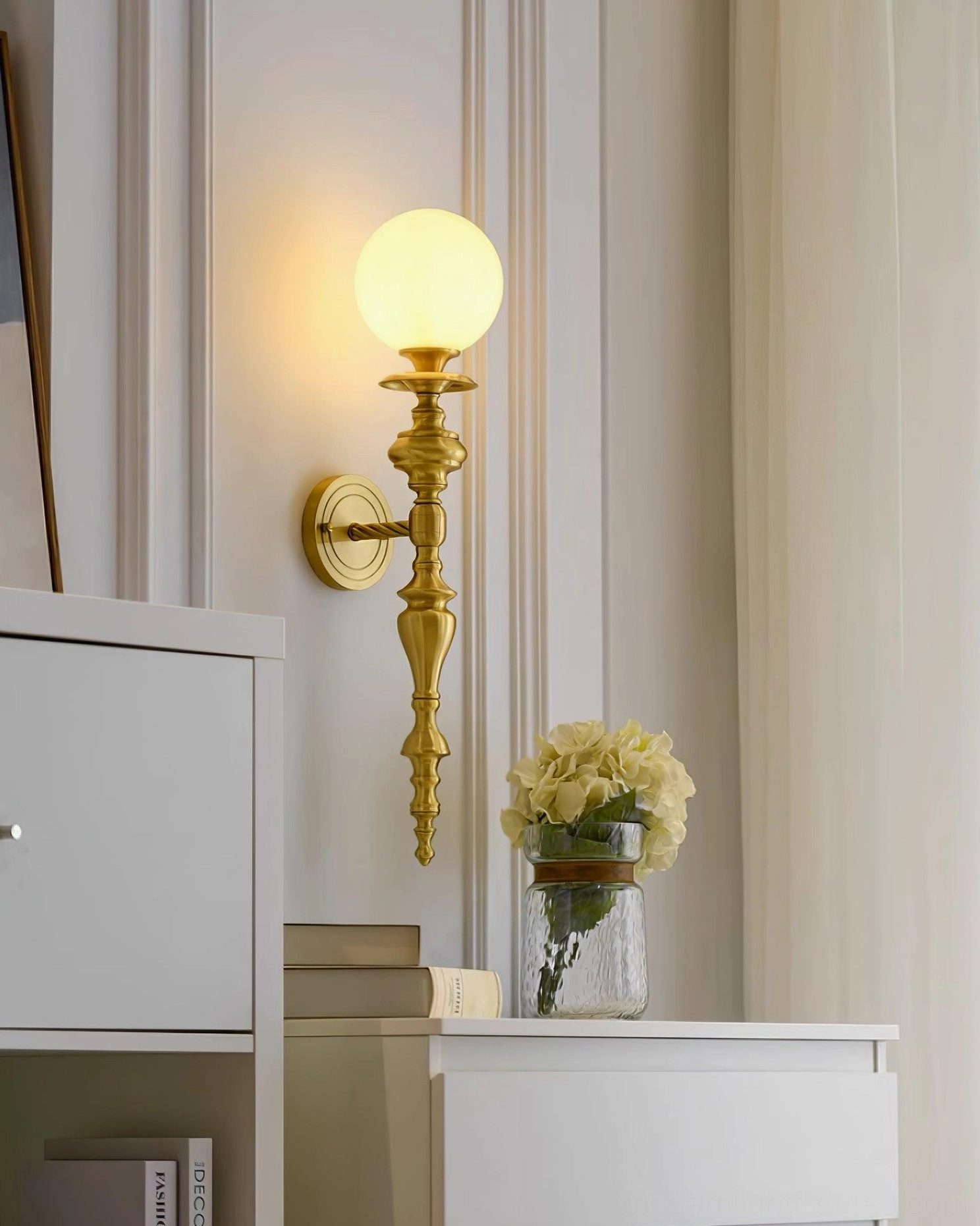 Wall mounted brass sconce detail view showing craftsmanship and hand-finished brass construction