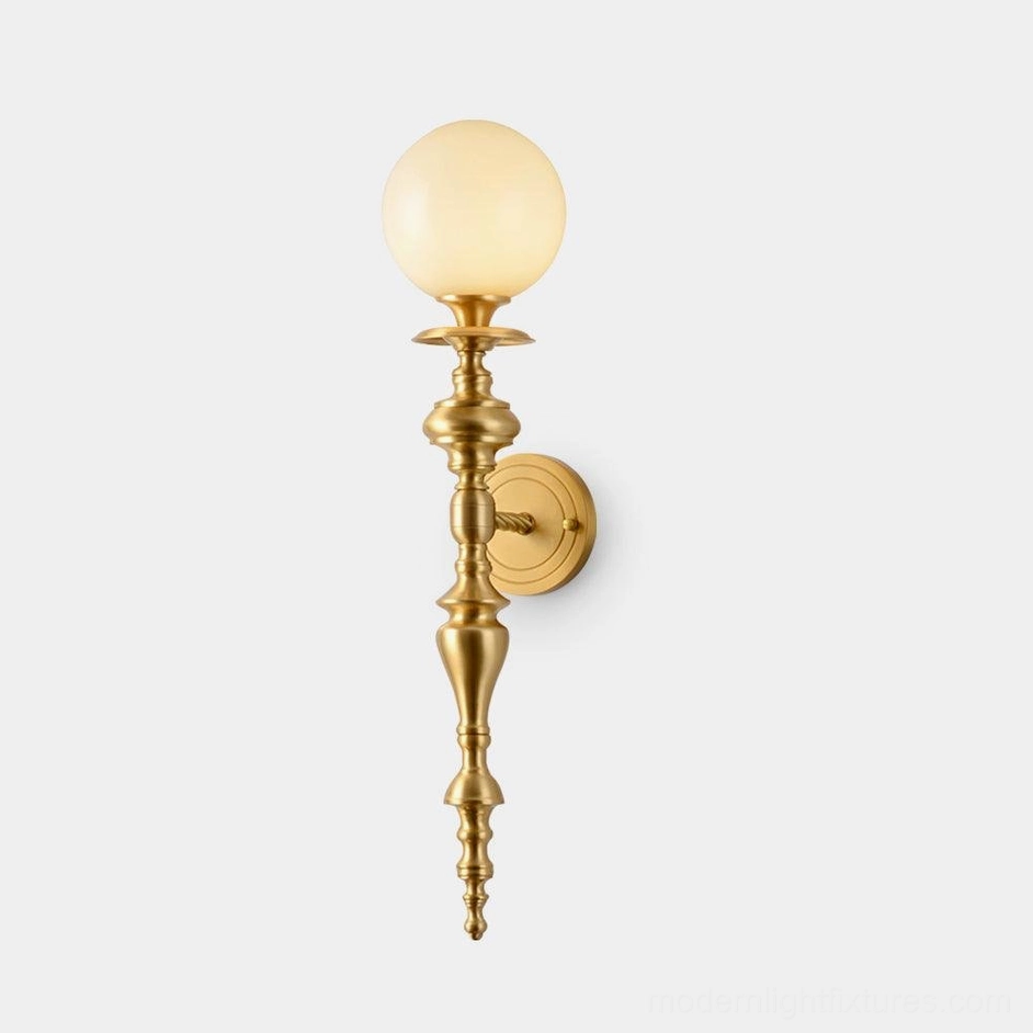 Beatty brass wall sconce full frontal view with polished gold finish and frosted glass globe shade