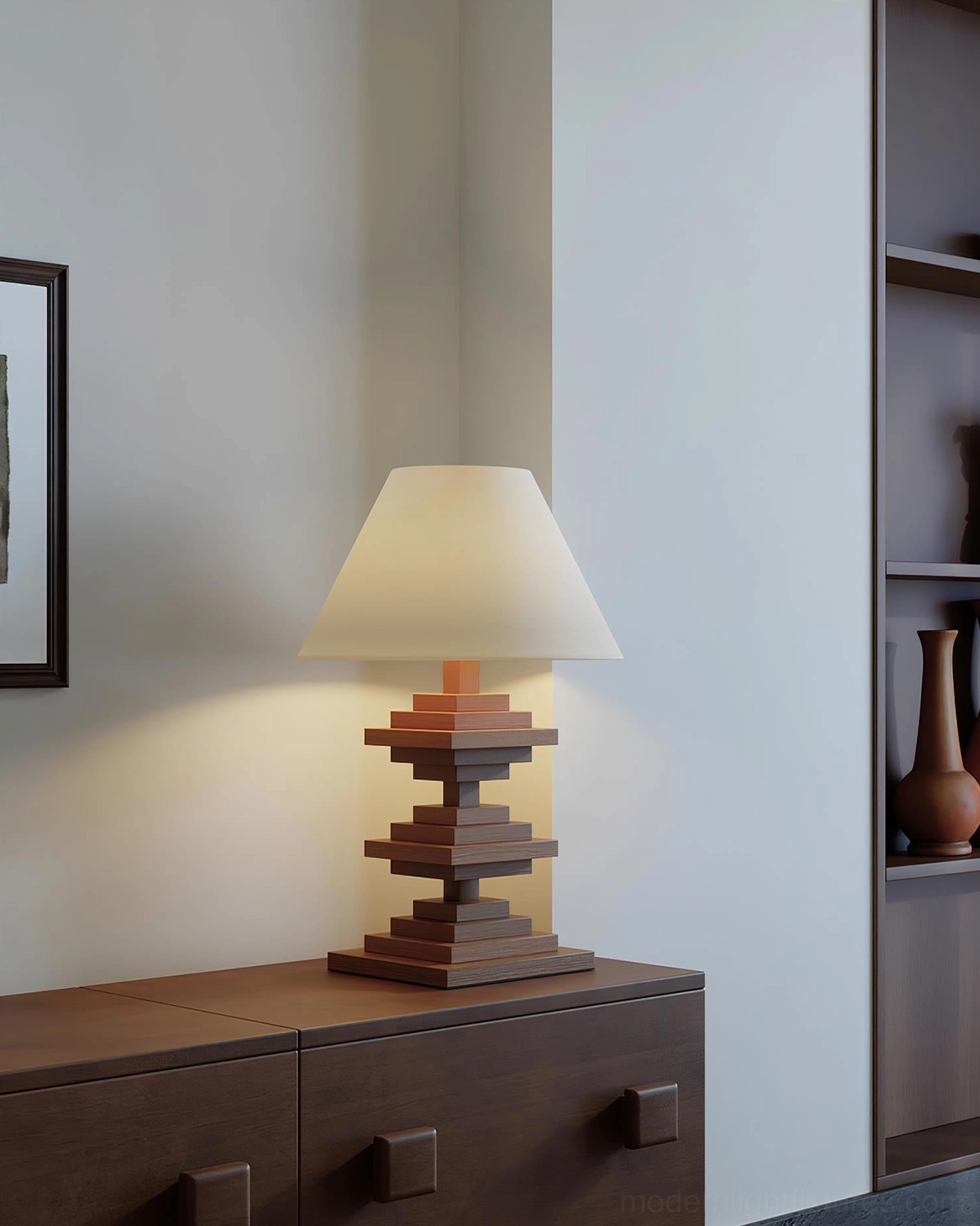 Geometric wooden tower table lamp in bedroom setting on dark wood dresser creating warm ambient lighting with modern interior décor