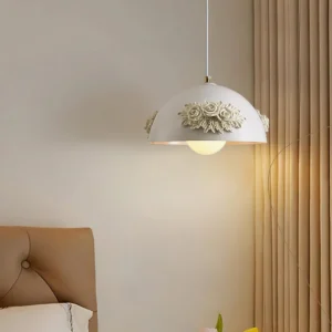 Decorative floral pendant lamp installed in cozy bedroom bedside scene, warm ambient lighting, romantic pastoral style interior design