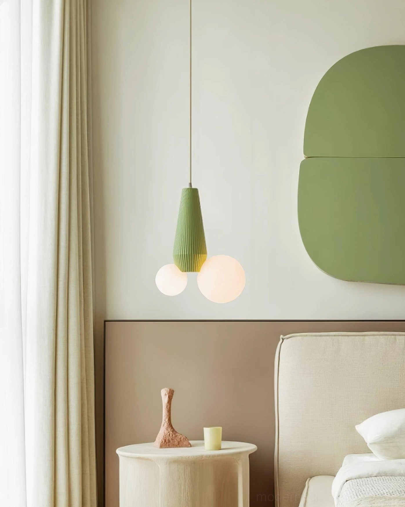Modern bedroom pendant light - sage green base with frosted globes above bedside table