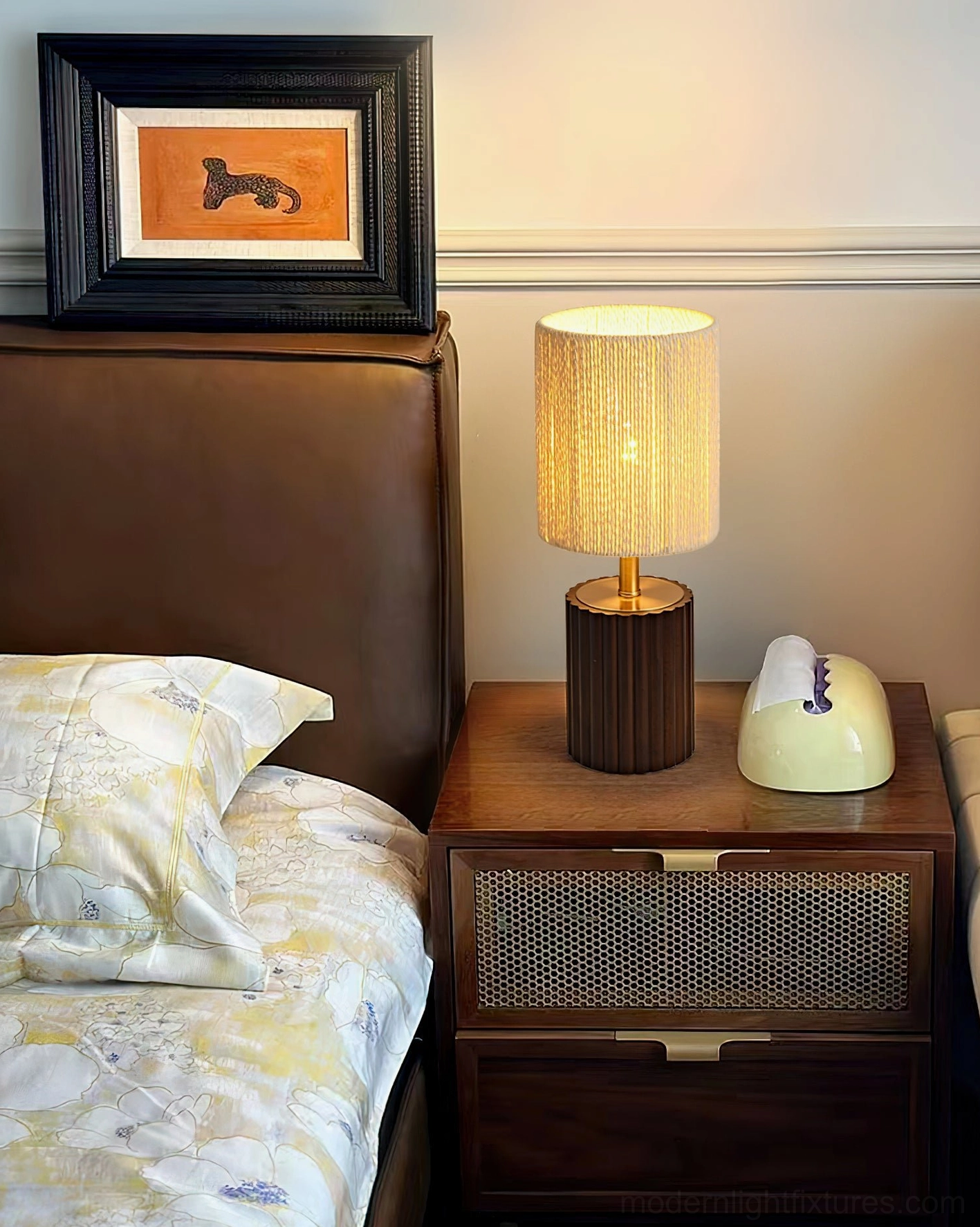 Bedside table lamp with cozy master bedroom ambiance and leather bedhead home decor styling