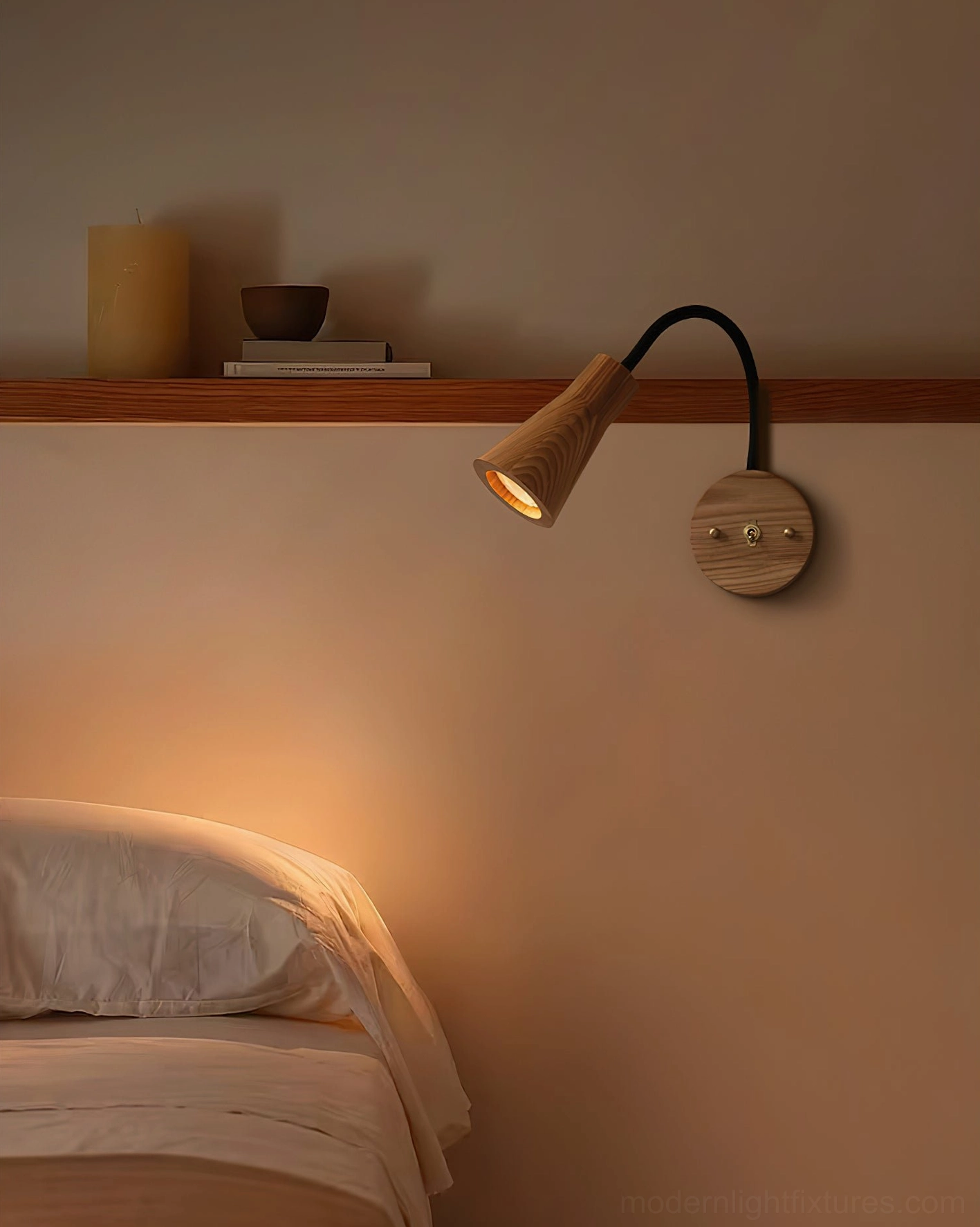 Bedside wooden wall lamp with adjustable gooseneck in dark finish, low-angle view showing warm glow