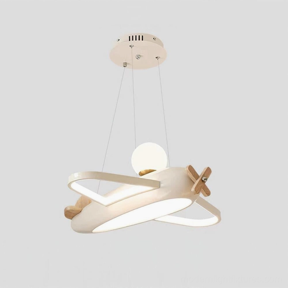 Beige airplane ceiling pendant creating warm comfortable atmosphere in contemporary minimalist kids room interior