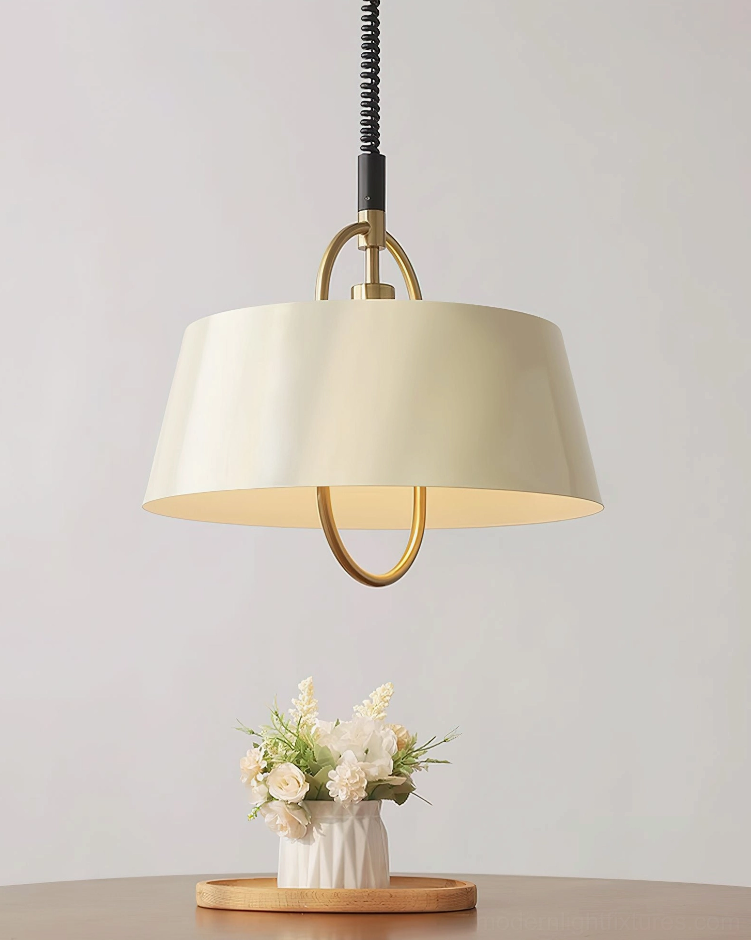 Angelo pendant light in beige tapered shade with neutral finish and brass suspension hardware