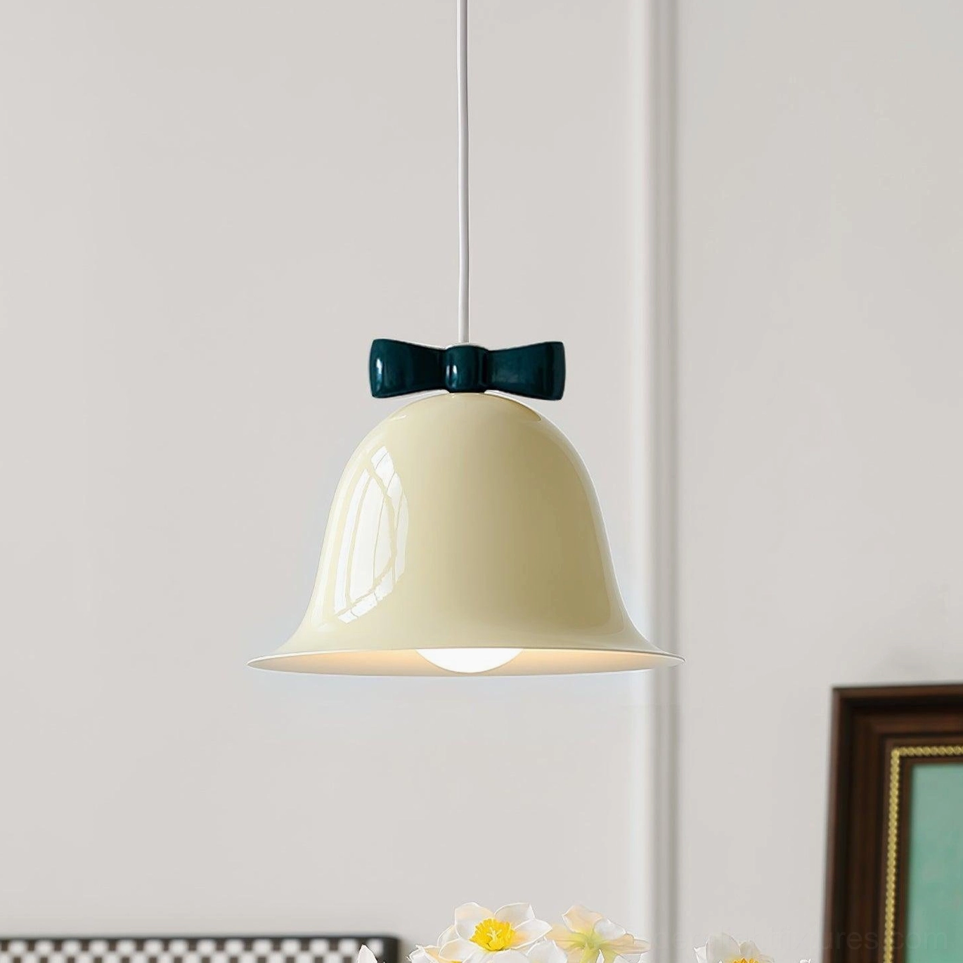 Beige and blue two-tone ceramic bell pendant lamp with decorative bow in studio view
