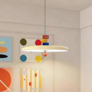 Beige geometric pendant fixture in contemporary living room setting with abstract wall art, side profile view