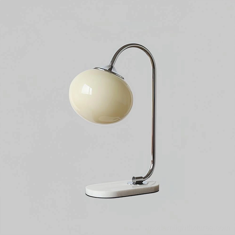 Beige globe table lamp shade with chrome metal frame and white marble base modern style