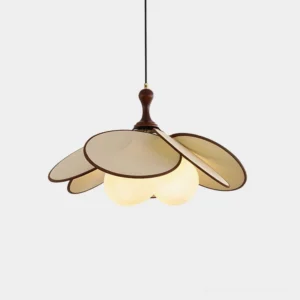 Lily petal pendant light with beige fabric petals and dark brown wood fixture, overhead studio view showing three frosted globe bulbs