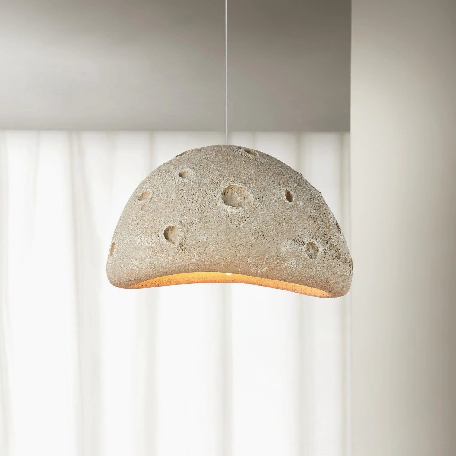 Beige meteorite crater pendant light interior design styling with minimalist furniture and contemporary decor