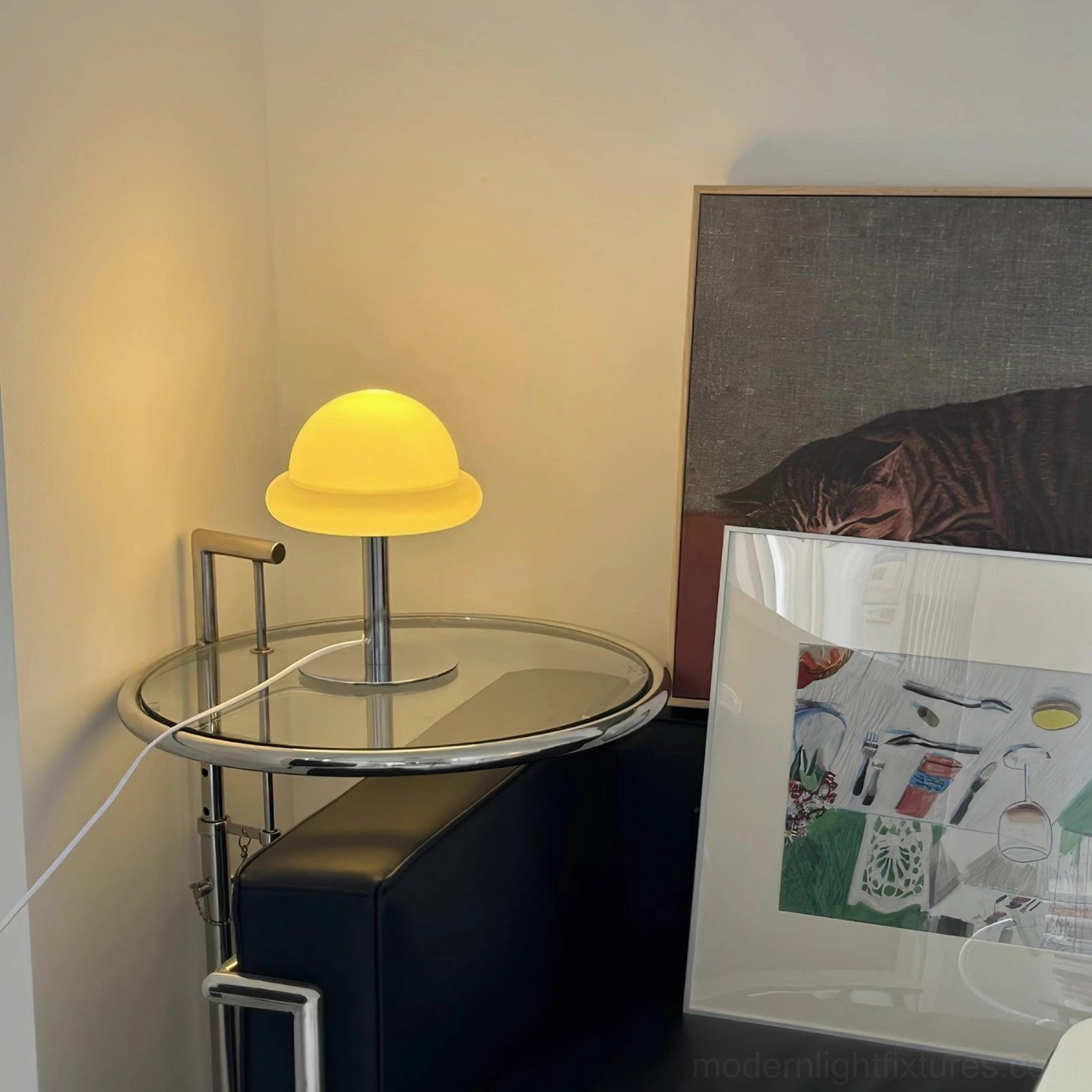 Kleine mushroom table lamp in soft beige shade creating warm ambient bedroom lighting