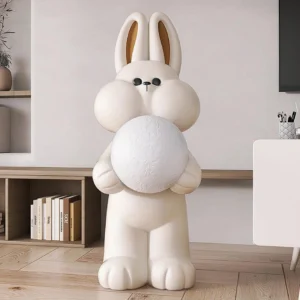Beige rabbit floor lamp with moon-shaped shade in modern living room with bookshelf interior design setting