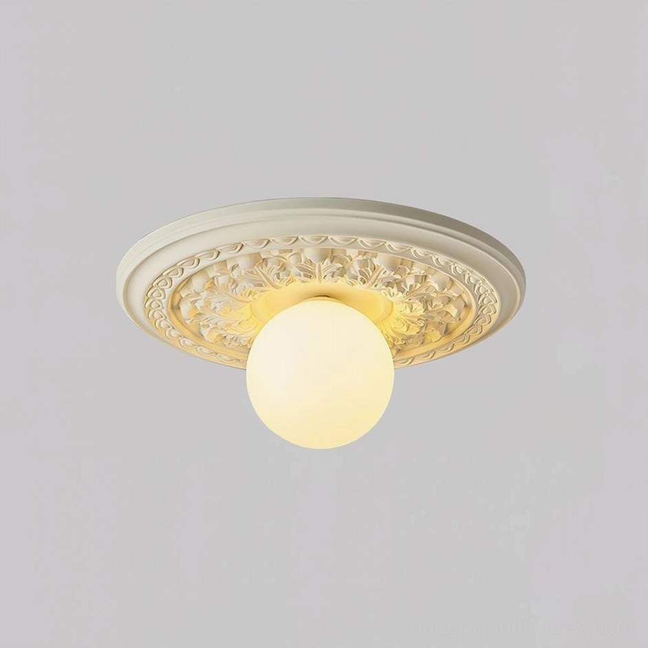 Modern resin ceiling light beige finish with carved floral pattern studio photograph