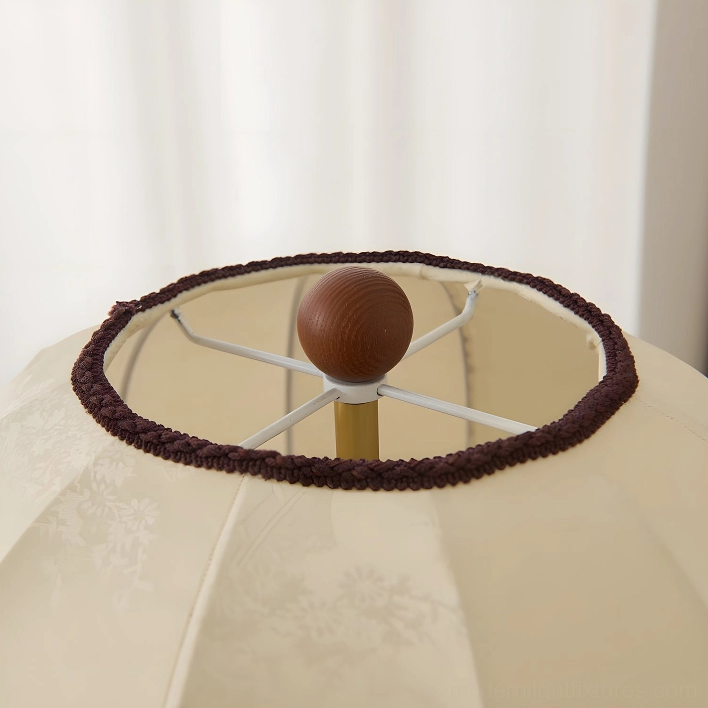 Beige scalloped fabric table lamp on side table - warm neutral color home decor styling