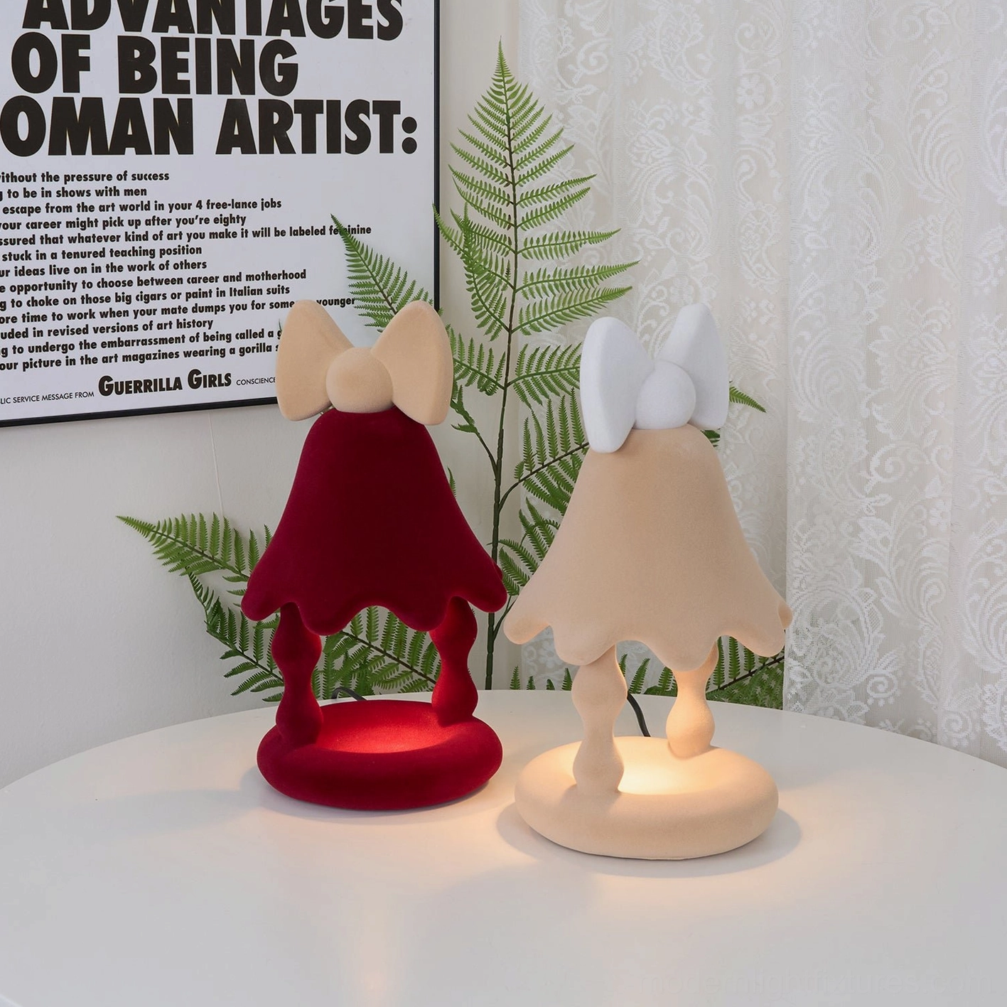 Beige Stacy candle warmer lamp complementing Scandinavian hygge-inspired bedroom interior with cozy soft furnishings