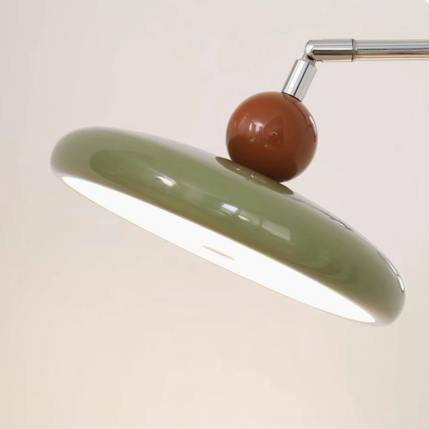 Beige disc shade wall sconce with chrome frame and wooden accent ball, warm neutral interior lighting