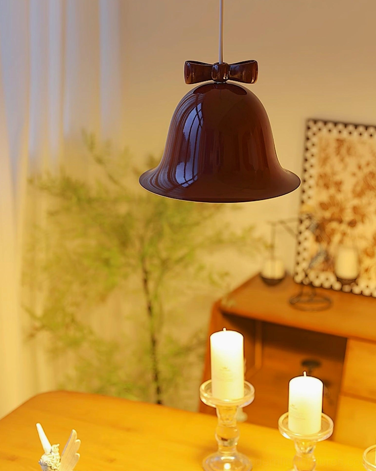 Bell-shaped pendant lamp ceramic shade closeup showing texture and glossy surface treatment