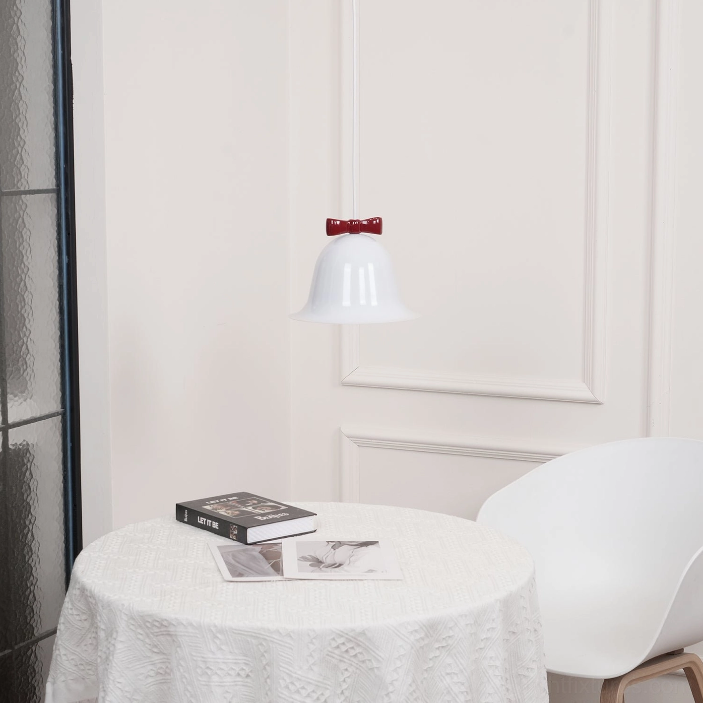 Ceramic bell-shaped pendant light in interior home design product showcase scene