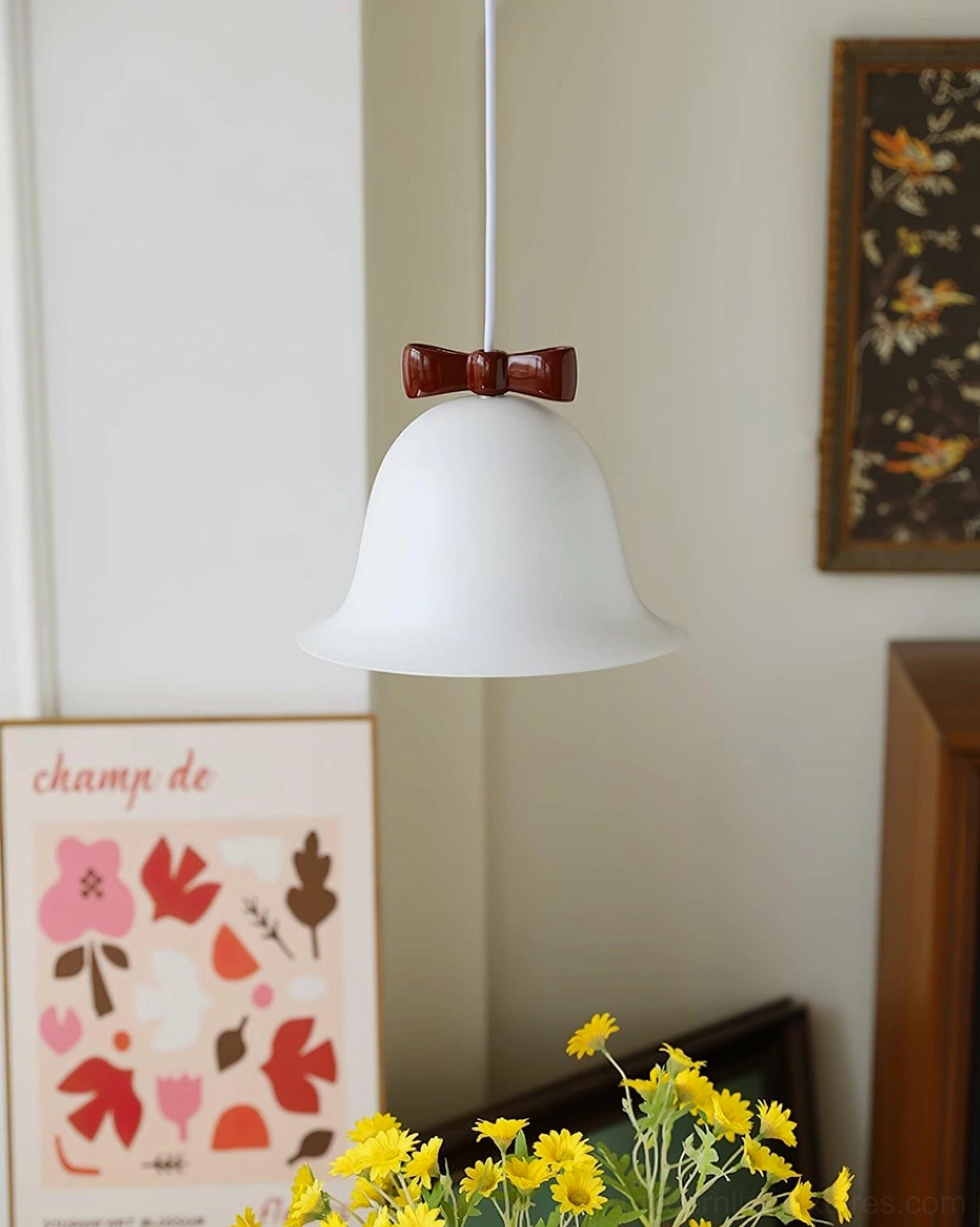 Ceramic bell-shaped pendant lamp hanging in kitchen island area with task lighting application