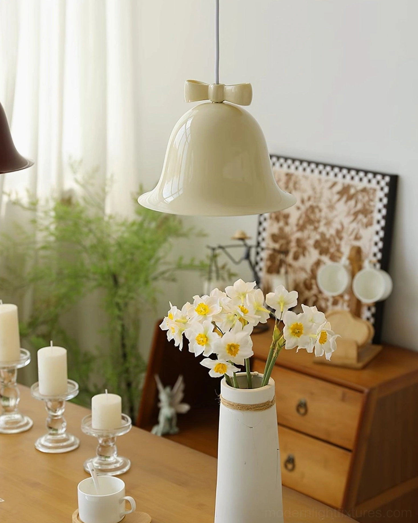 Bell pendant lamp showing side profile and dimensional bell silhouette in studio lighting