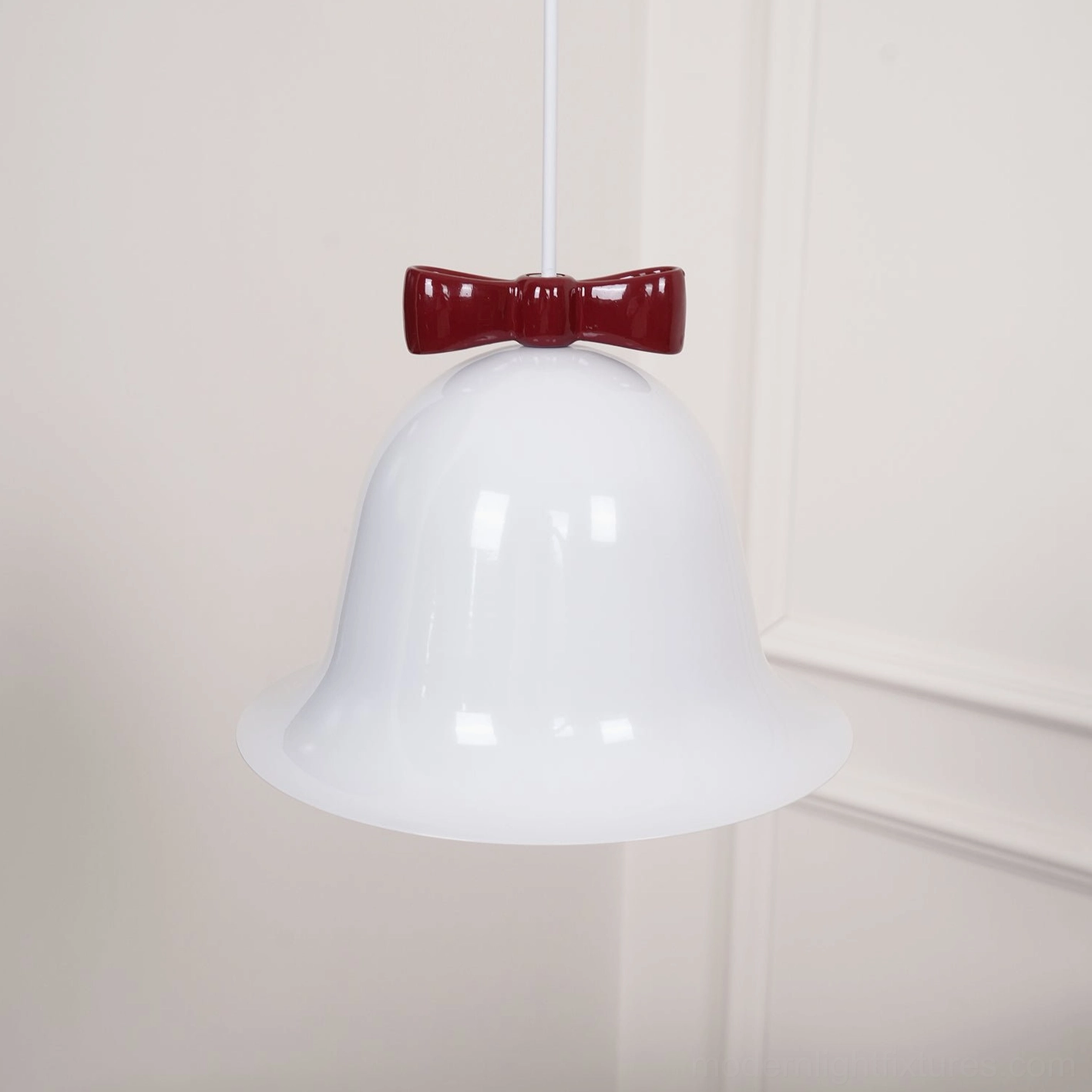 Bell pendant lamp with decorative bow detail product photography studio gallery