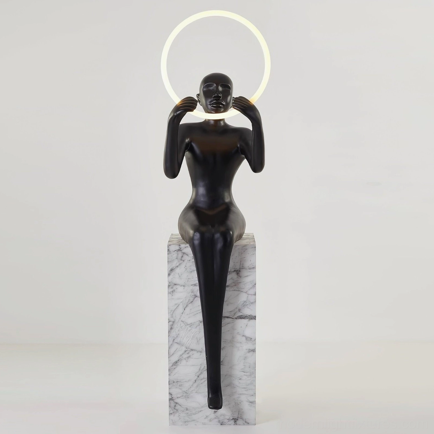 Bella matte black sculptural halo floor lamp full profile view with integrated LED halo ring