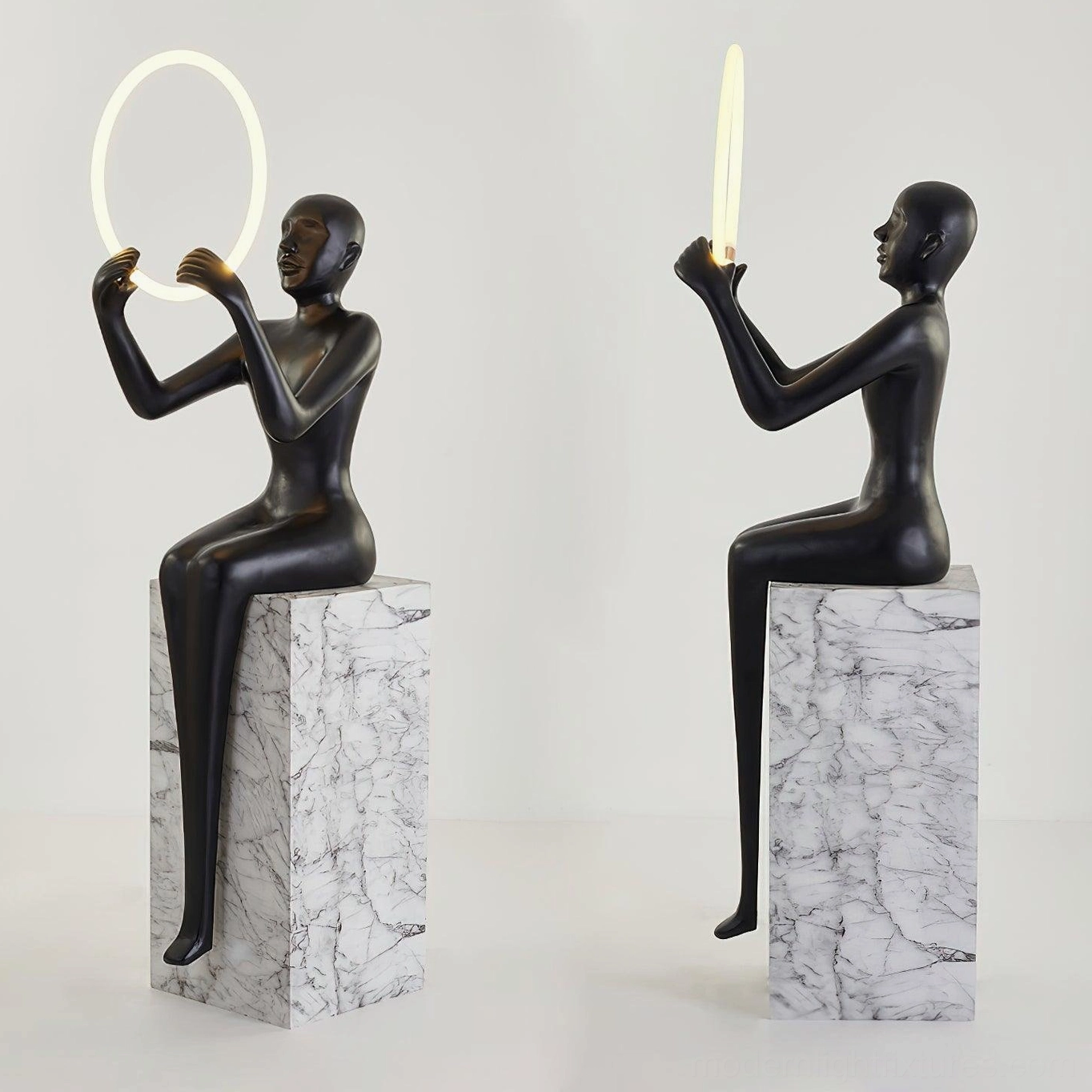 Comparison of two Bella sculptural halo floor lamp variants in matte black on white background