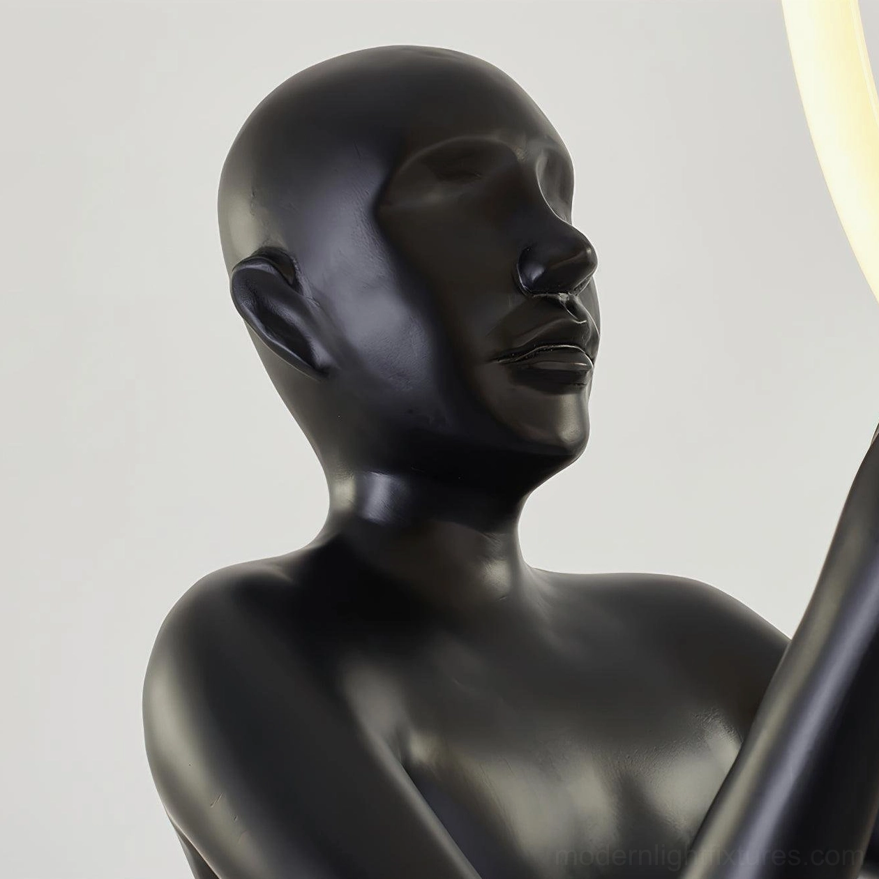 Bella sculptural floor lamp with glowing LED halo ring demonstrating artistic lighting design