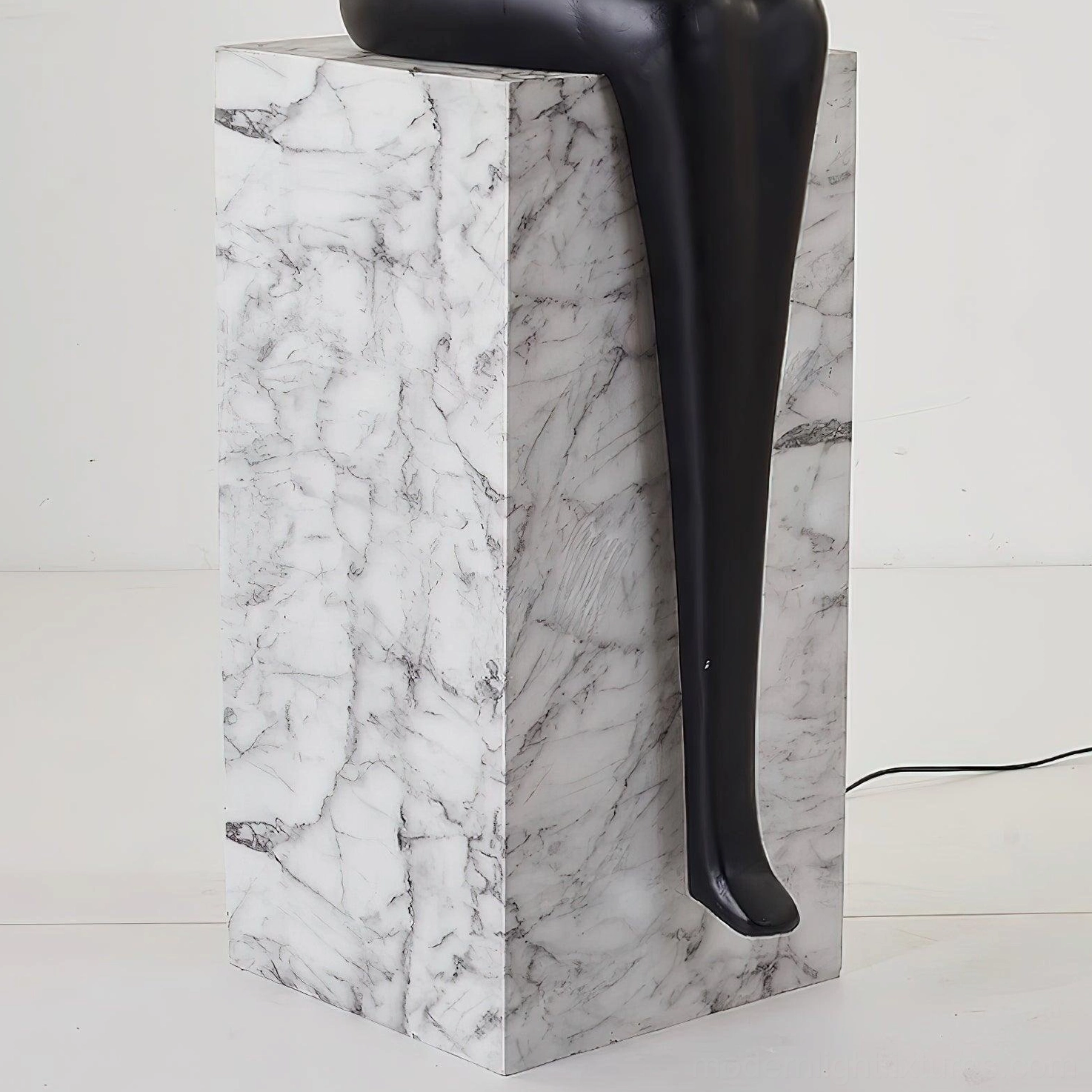 Bella sculptural halo floor lamp showcasing premium resin pedestal and integrated LED ring technology