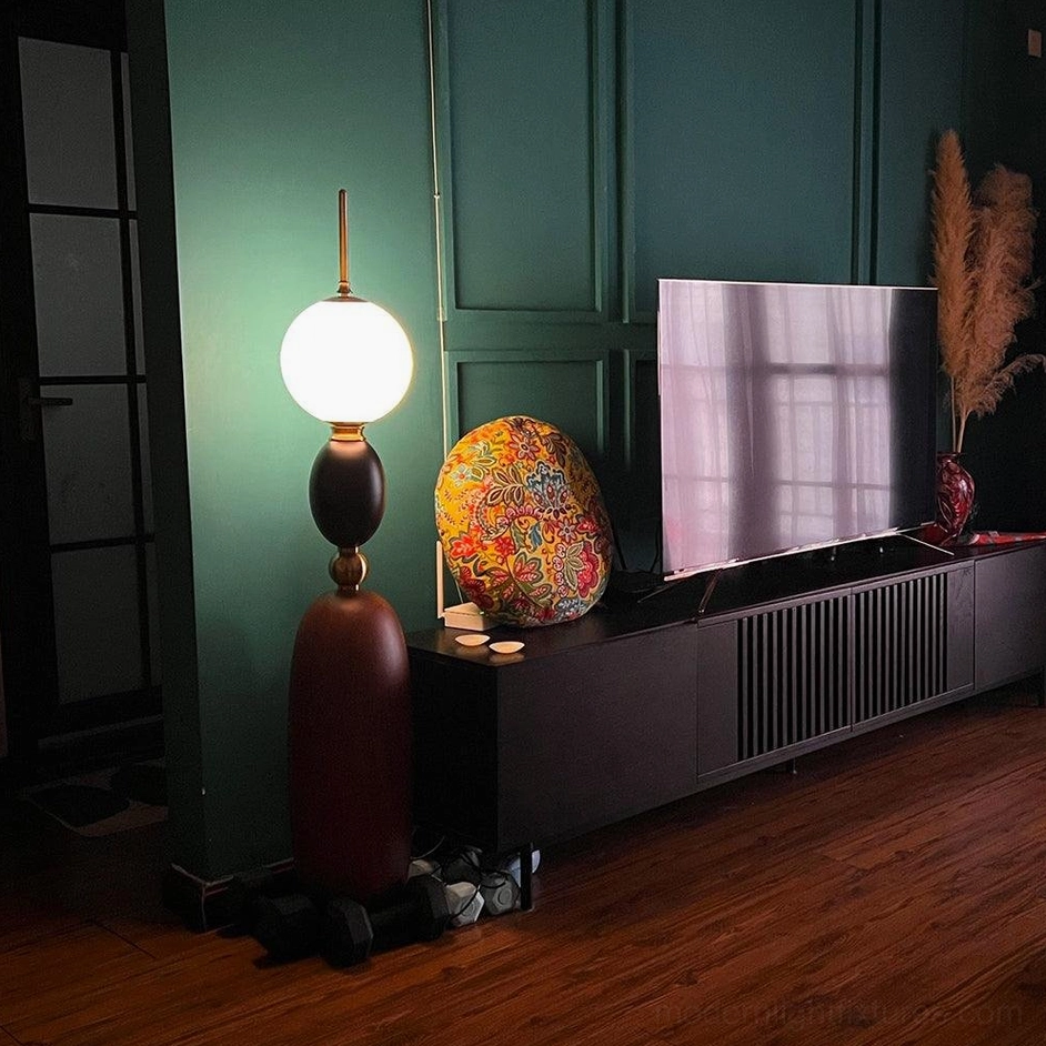Bellamy modern floor lamp scale and proportion in furnished living space context
