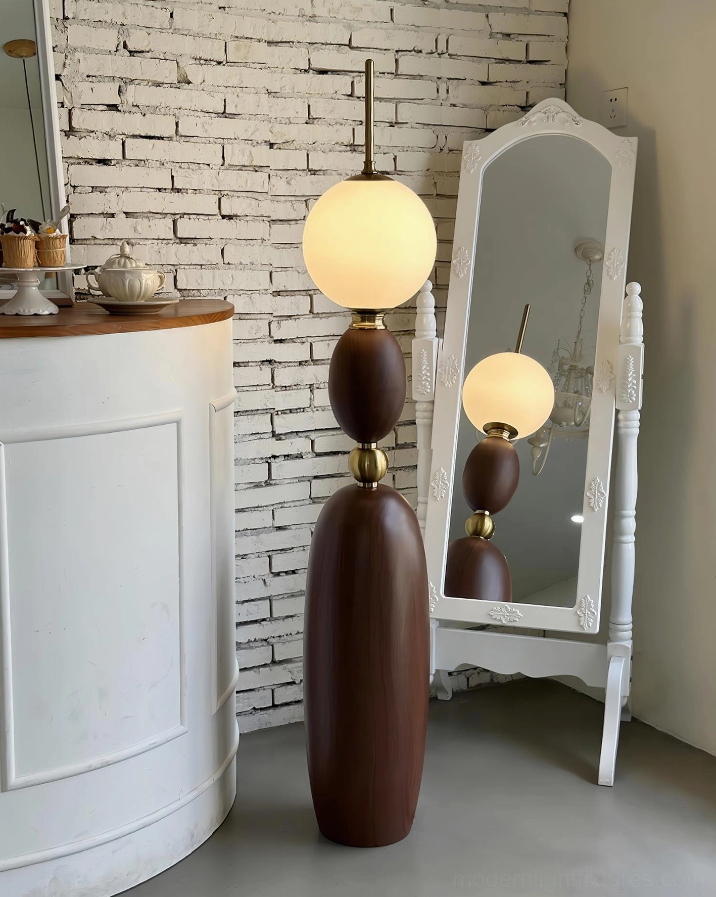 Walnut wood grain Bellamy floor lamp with brass hardware in vintage retail space interior