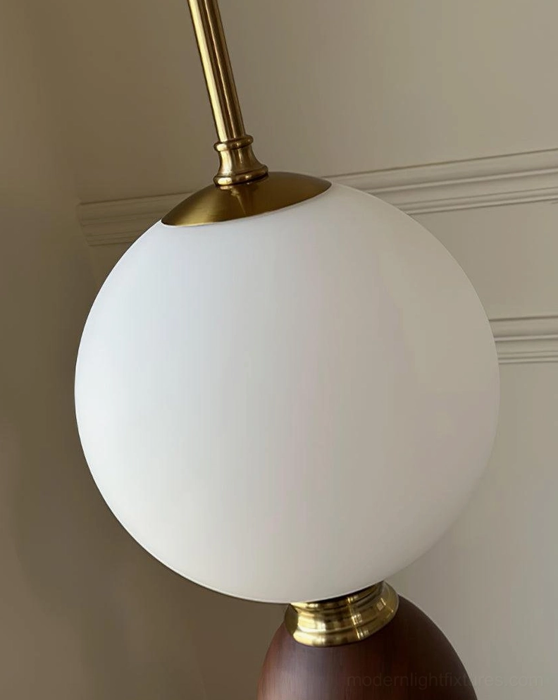 Matte black Bellamy floor lamp with sculptural silhouette in modern room corner setting