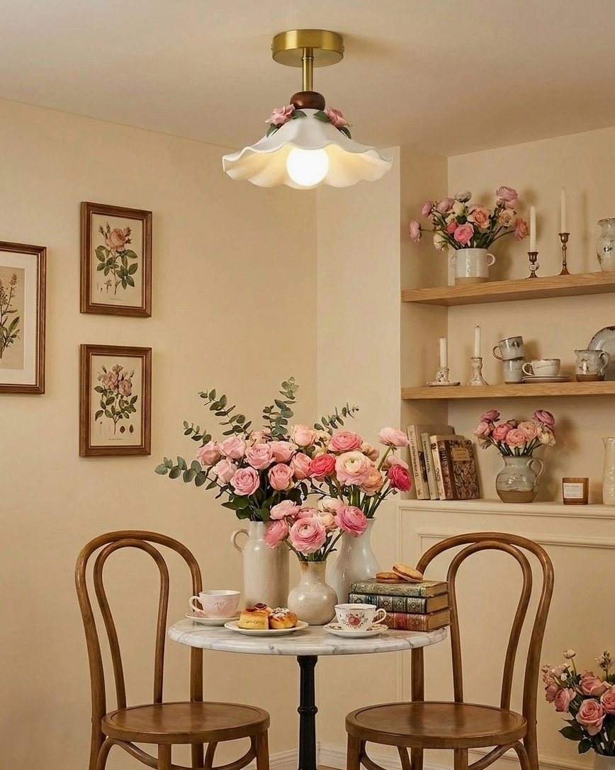 Bellarose ceramic semi-flush ceiling light in vintage dining corner with exposed bulb and pink ceramic roses catching warm lamplight