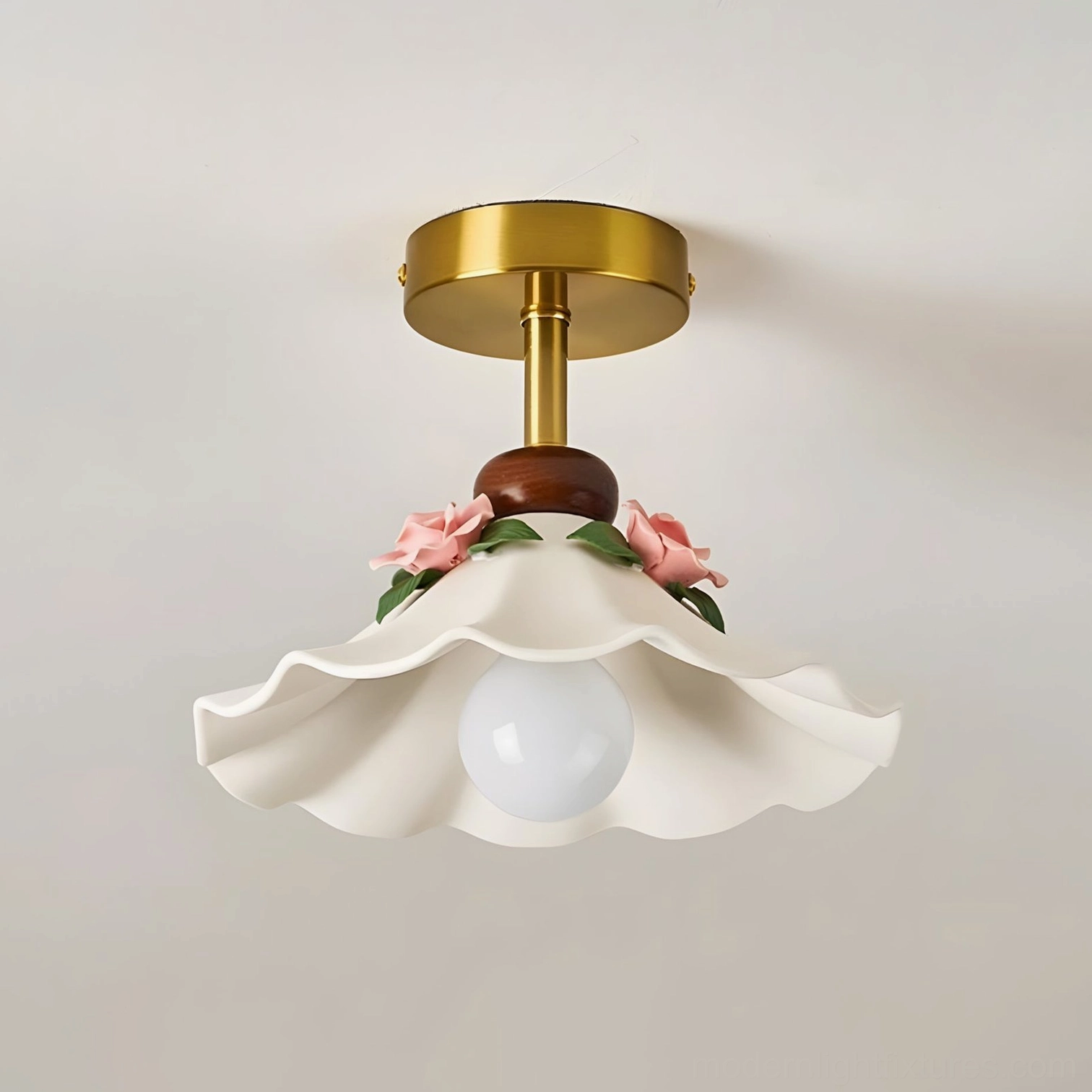Bellarose ceramic flush mount light with scalloped petal-edge shade and hand-applied pink roses and green leaves — overhead studio view