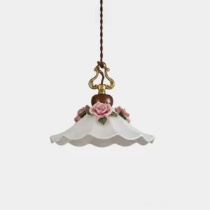 Bellarose ceramic pendant light with pleated white shade and hand-applied pink rose accents, front studio view
