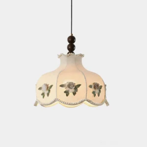 Bellarose rose appliqué pendant light with scalloped ivory fabric shade and pearl trim detailing, studio front view