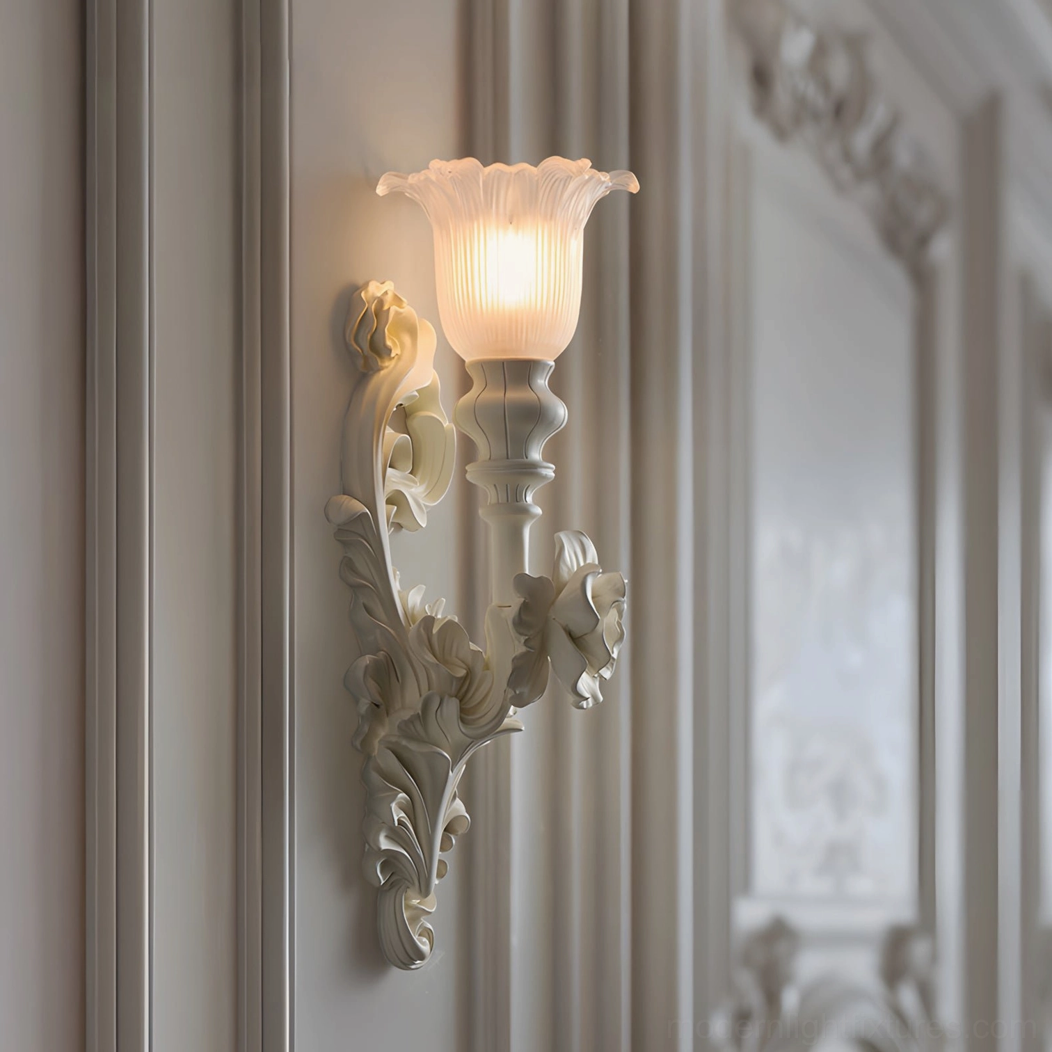 Bellarose ornate wall sconce close-up showing hand-carved rose and leaf-like curve details