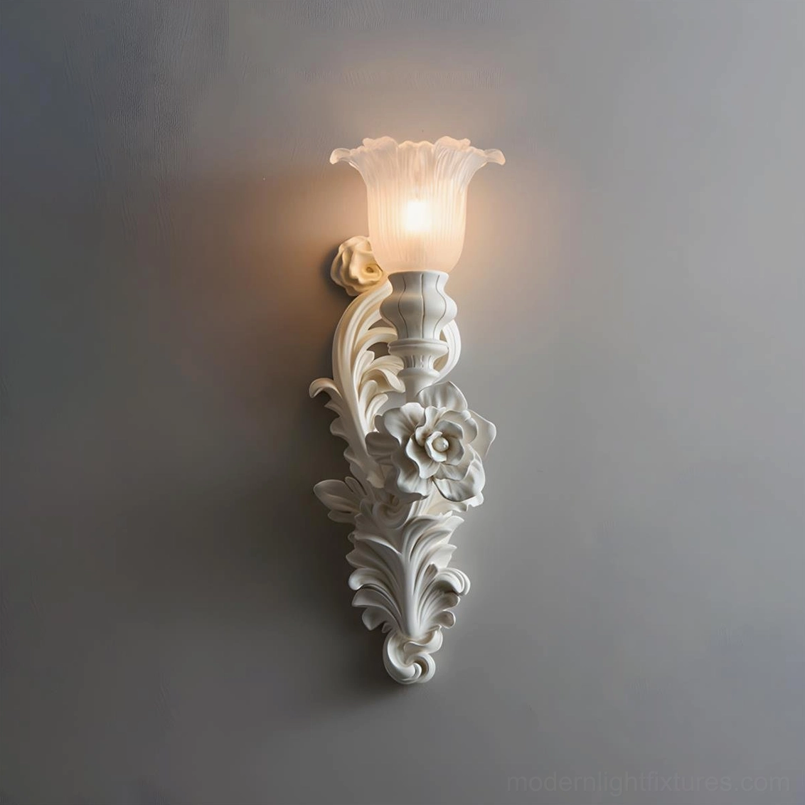 Bellarose rose-carved plaster wall lamp on gray background, product showcase studio lighting
