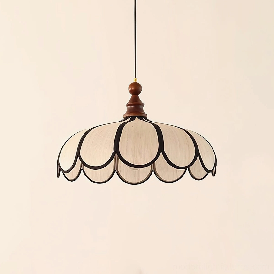 Bellerin pendant lamp in intimate reading corner with warm lighting and Scandinavian minimalist surroundings