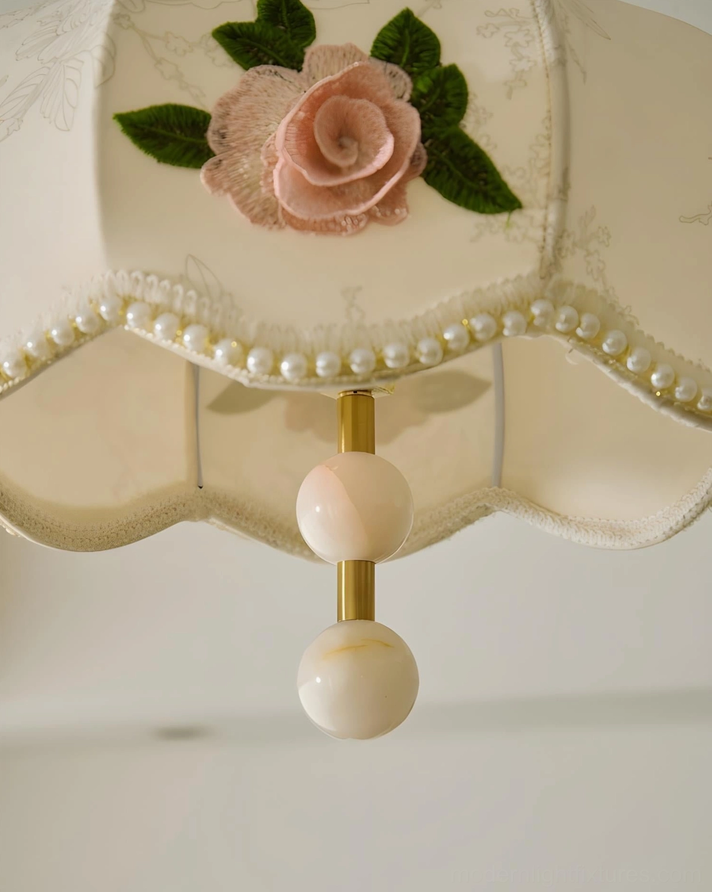 Bellevia embroidered pendant lamp in interior setting showing soft romantic illumination and fabric shade texture