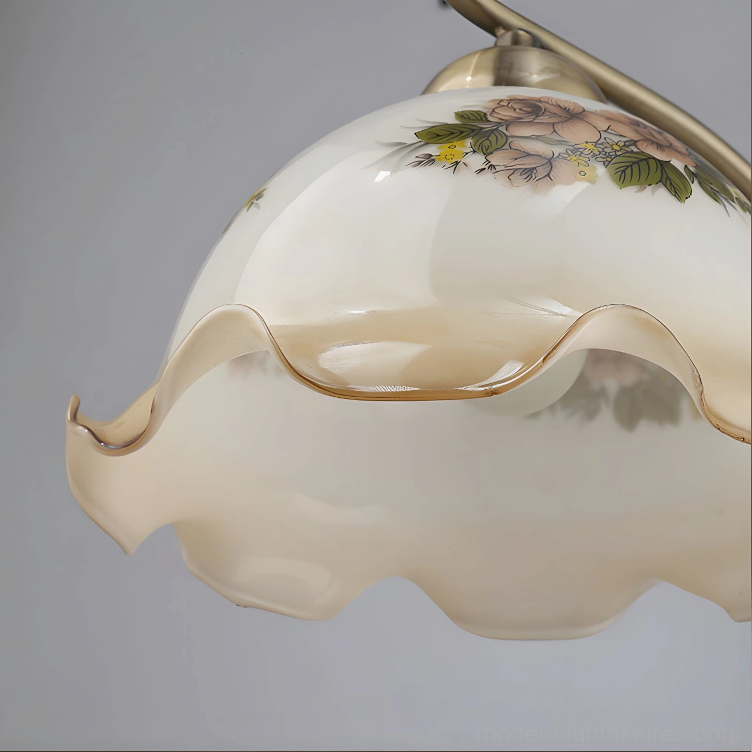 Bellevine antique bronze table lamp with floral glass shade and graceful curved metal stem detail