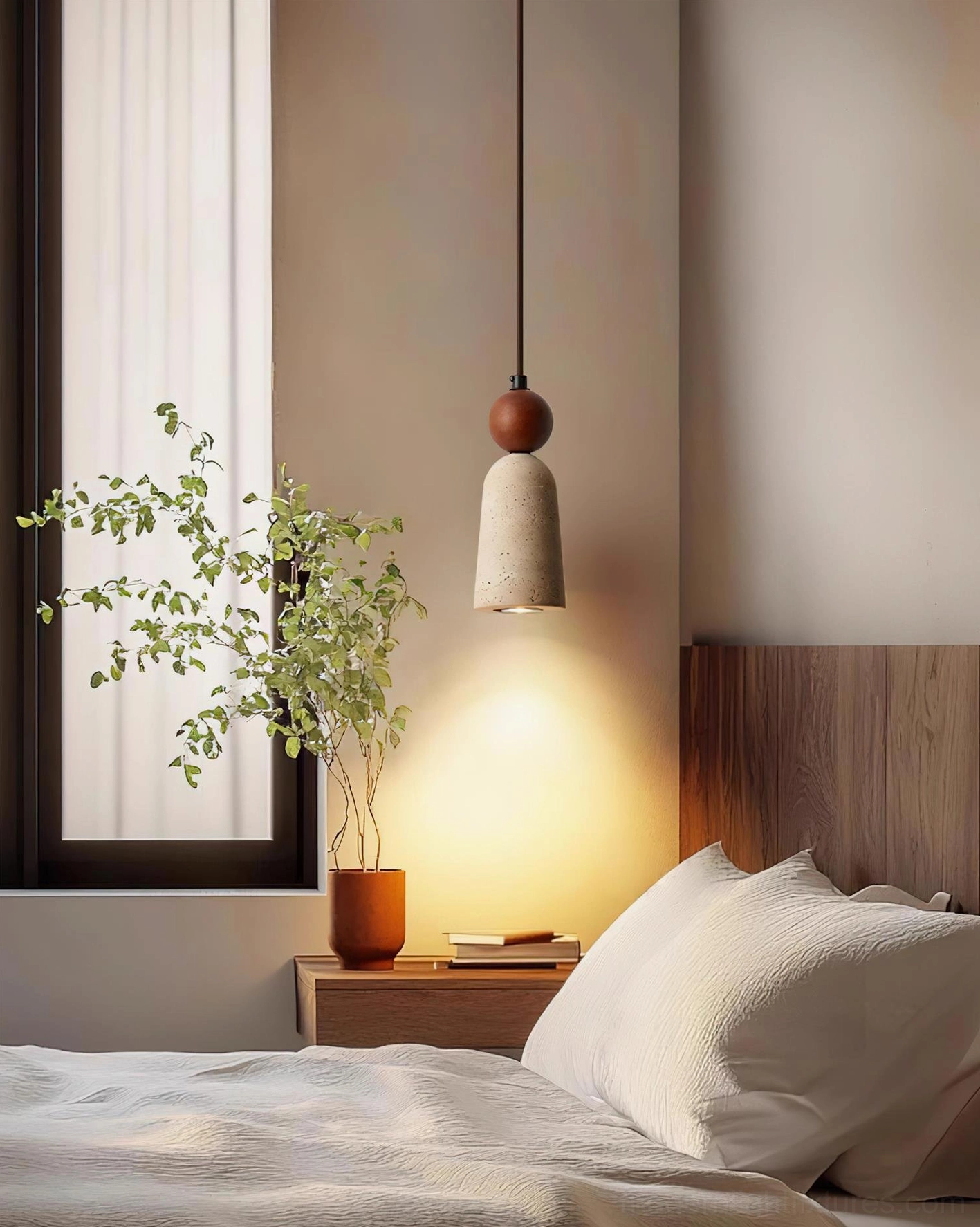 Bellin pendant light creating warm ambient glow above modern bedroom bedside in minimalist interior