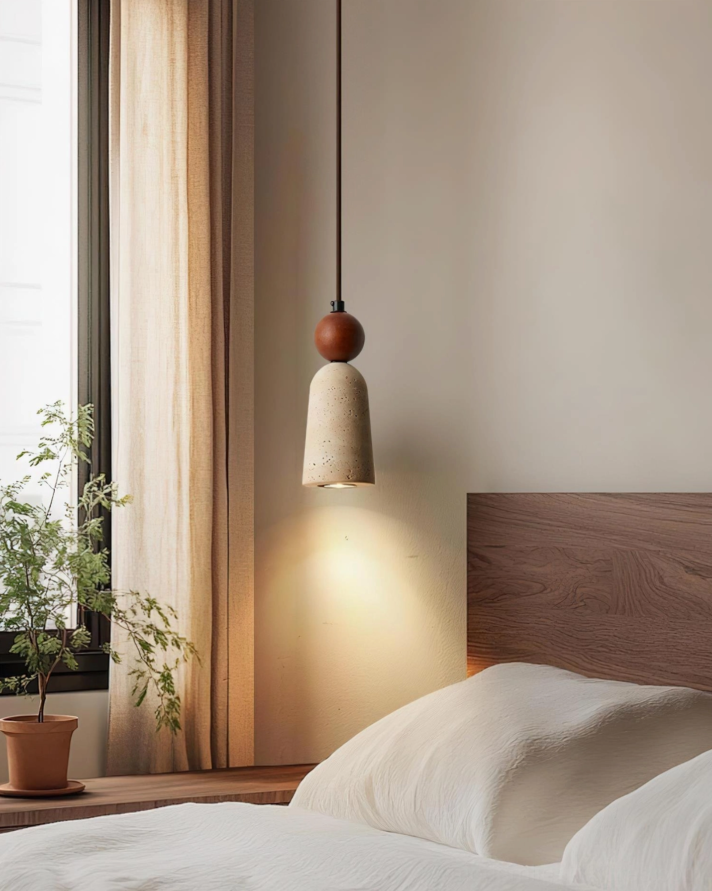 Bellin pendant lamp above wooden headboard in contemporary bedroom with sheer curtains and warm lighting