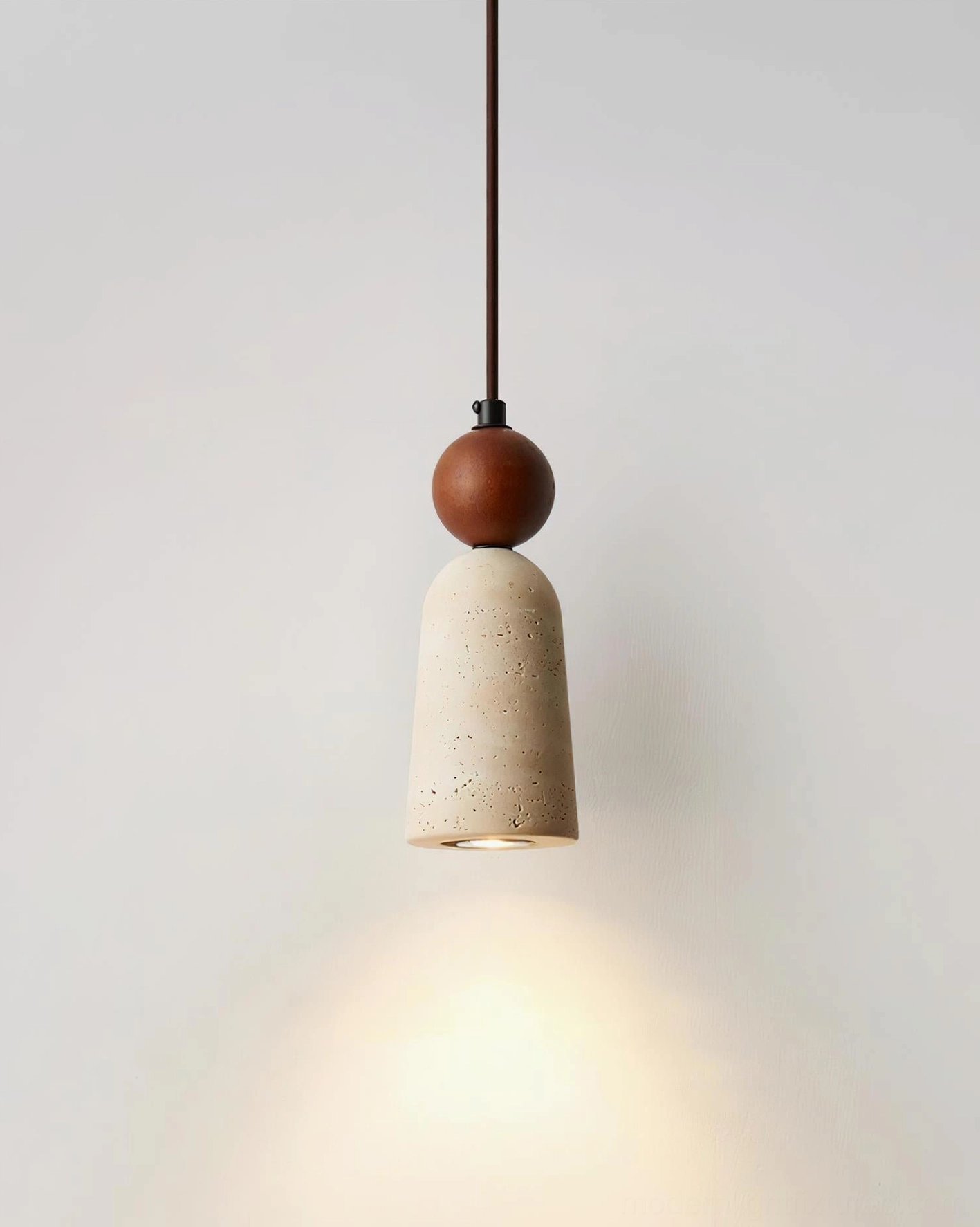 Bellin pendant light with natural wood accent bead hanging in modern interior space with ambient wall glow