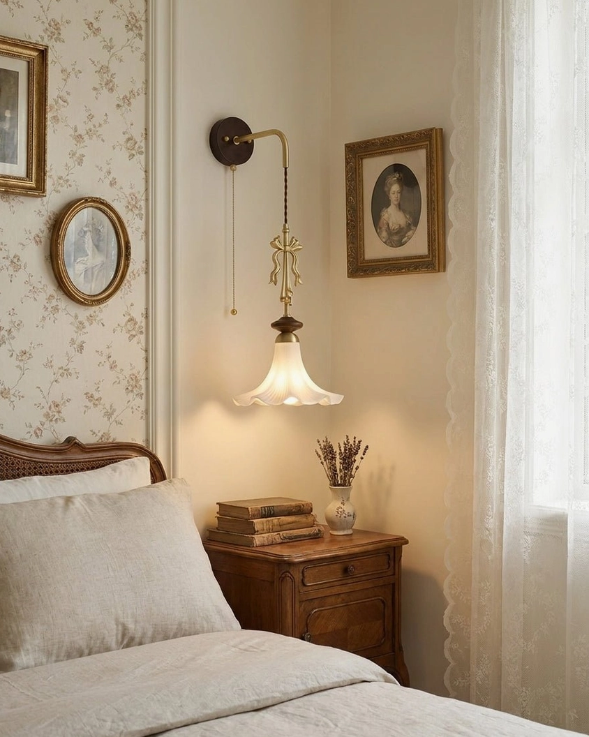 Bellora wall sconce bedside lamp with romantic vintage design on wooden nightstand and floral wallpaper